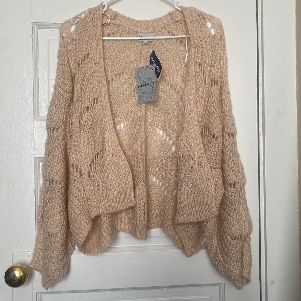 Cream colored knit cardigan